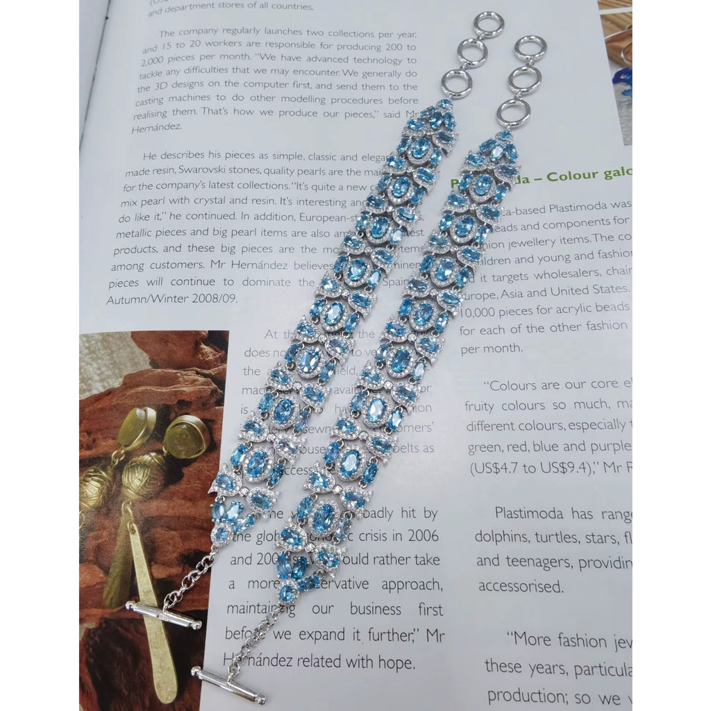 925 Silver Polished Natural Swiss Blue Topaz 4x6mm Oval-Cut Link Tennis Bracelet