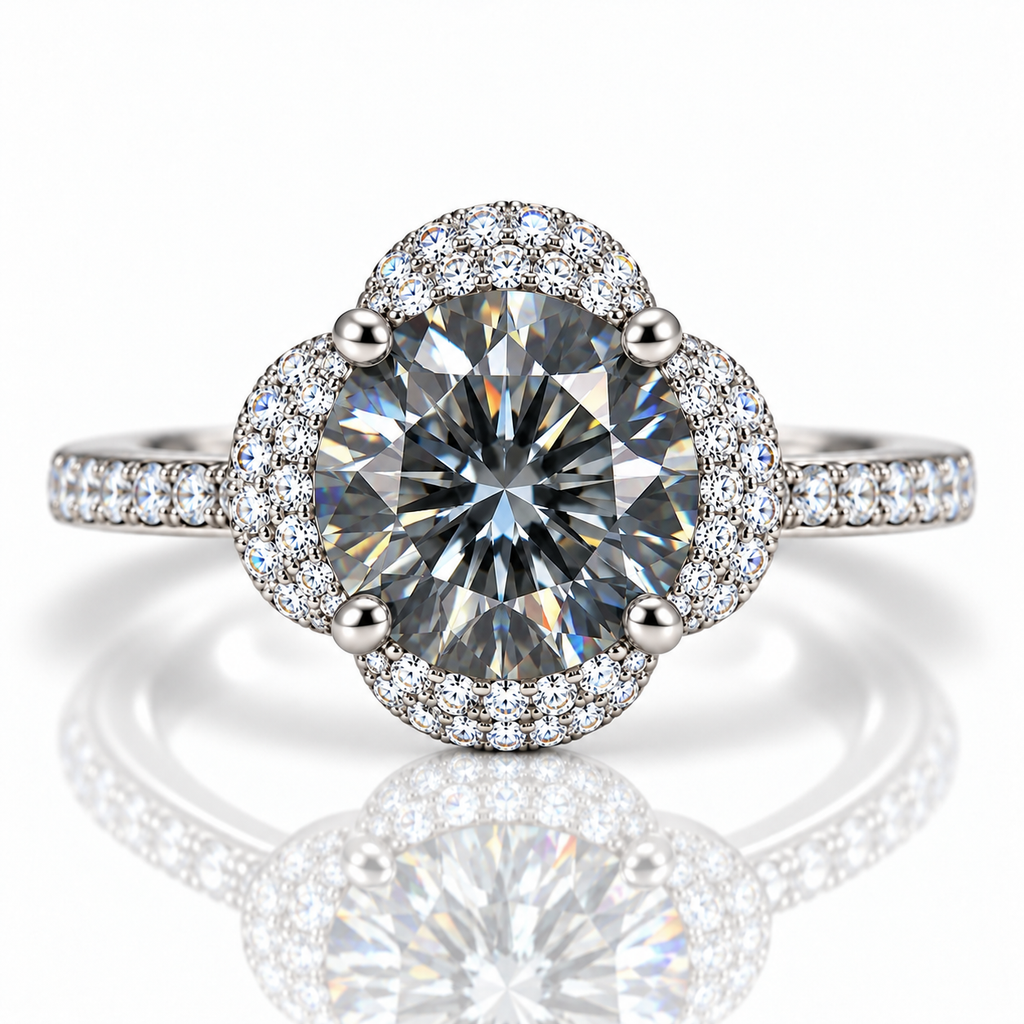Top-down view of an 8mm VVS1 gray moissanite ring highlighting the round brilliant center gemstone, symmetrical four-petal floral halo and pavé cubic zirconia band accents.