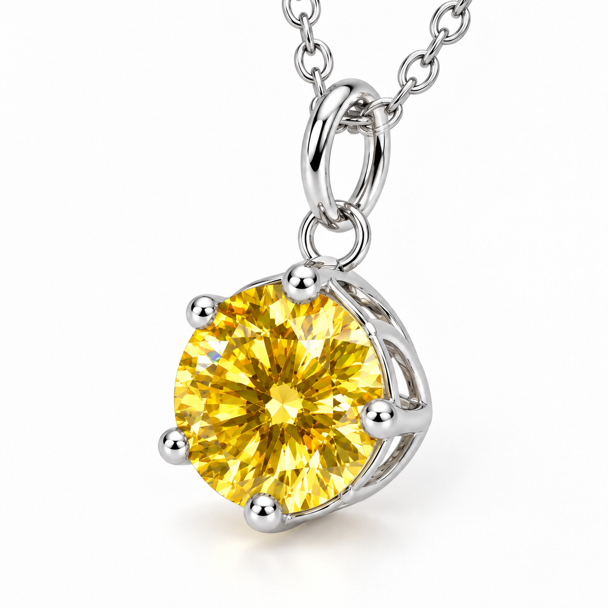 Angled view of an 8mm round brilliant yellow moissanite pendant necklace displaying vibrant golden facets, polished silver prongs, an open solitaire setting, and a delicate sterling silver chain.