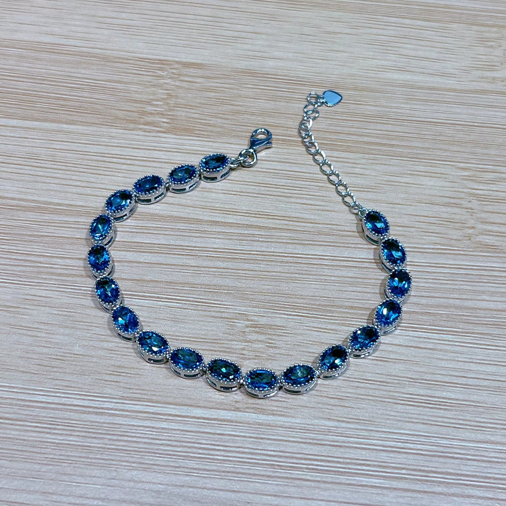 London Blue Topaz Tennis Bracelet Oval Cut VVS Grade 4x6mm 925 Sterling Silver