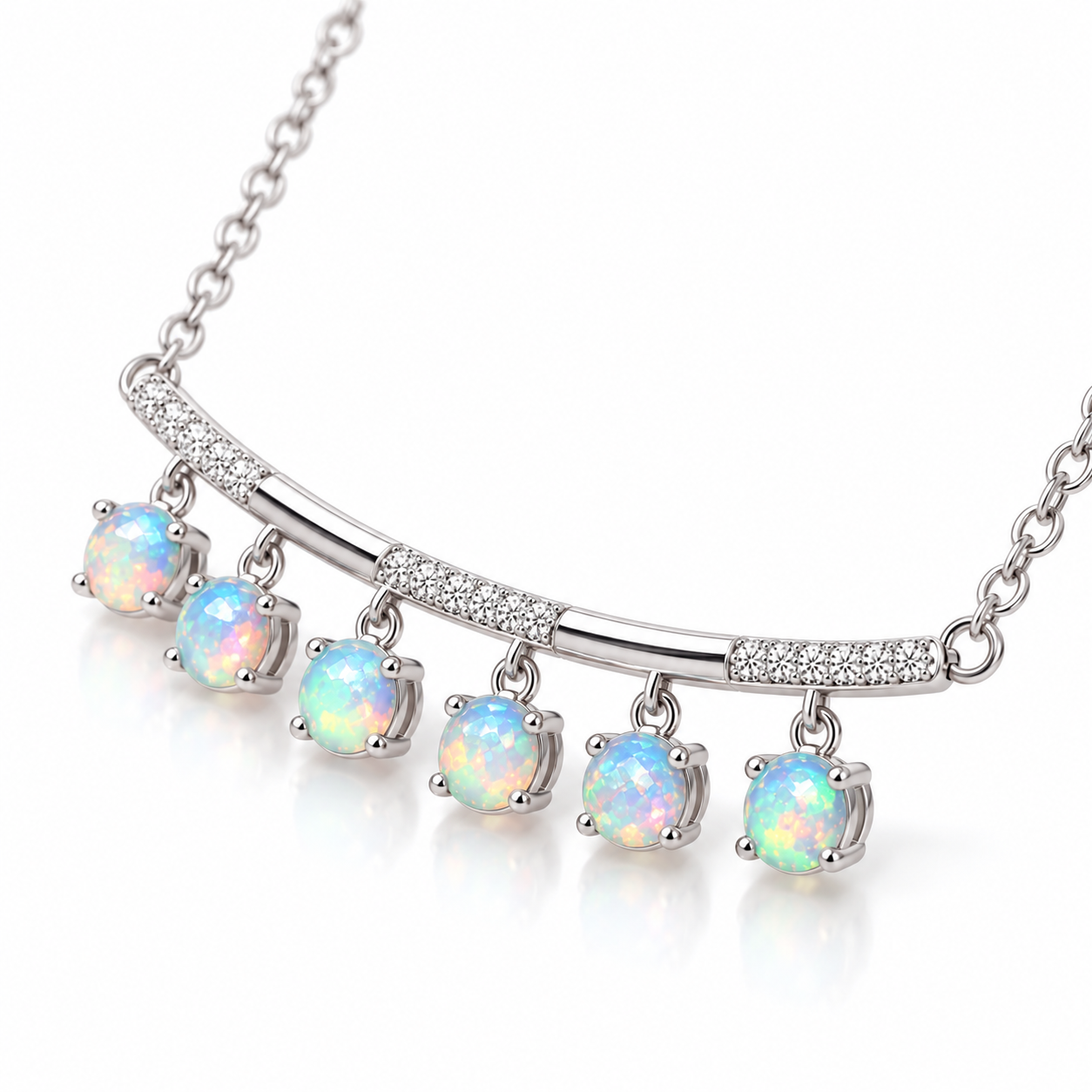 Detailed side view of 3mm round fire opal gemstones on sterling silver necklace