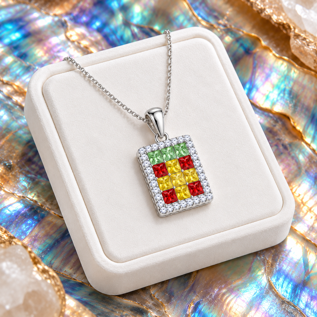 Multicolor gemstone pendant necklace displayed on white velvet with an iridescent colorful background