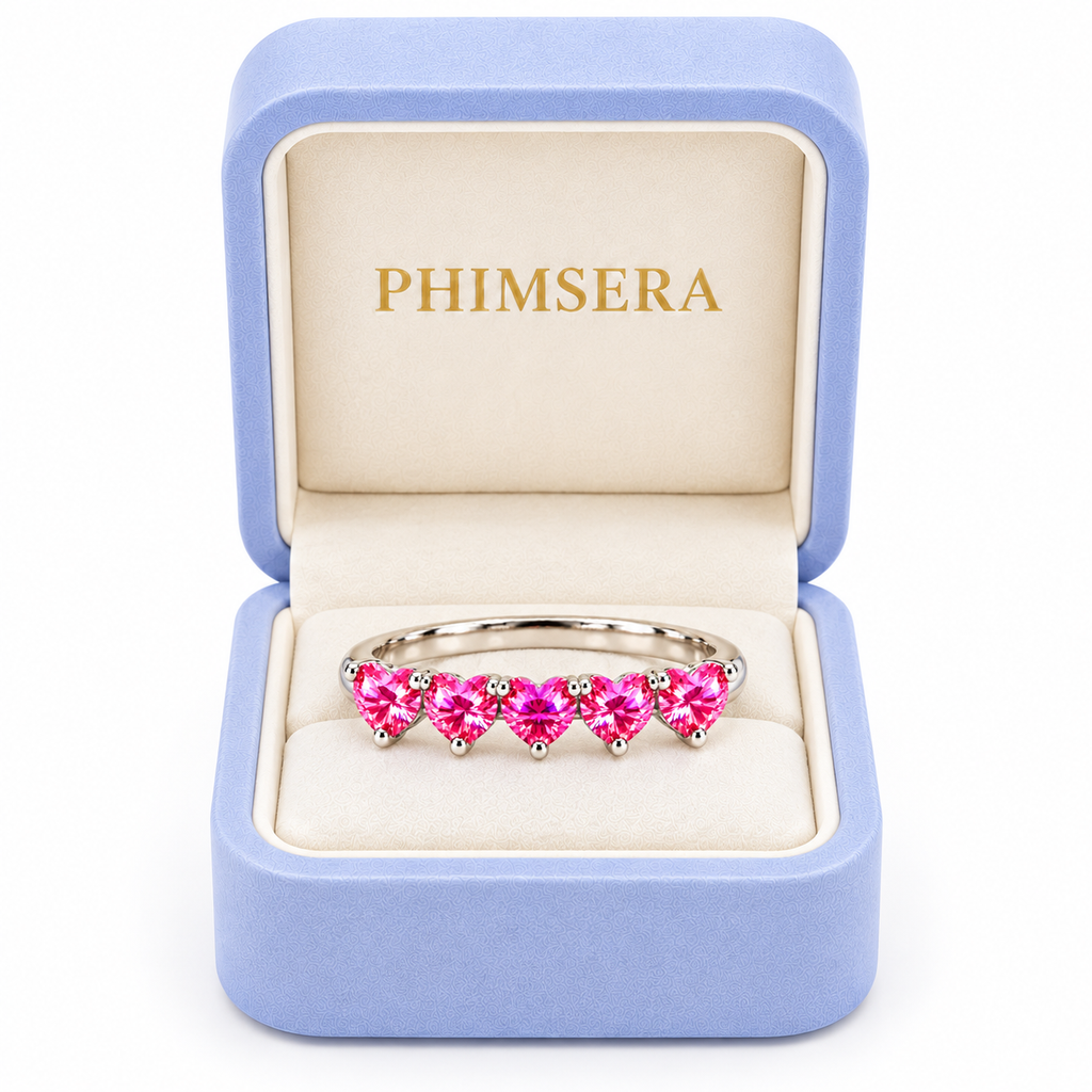 Five 4mm heart-cut pink moissanite ring presented in a Phimsera jewelry box