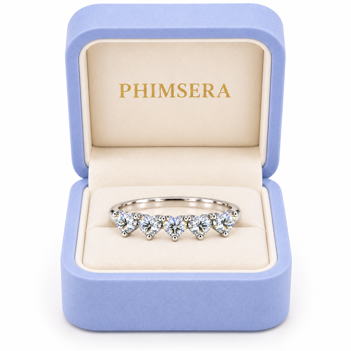 Five 4mm heart-cut white moissanite ring presented in a Phimsera jewelry box