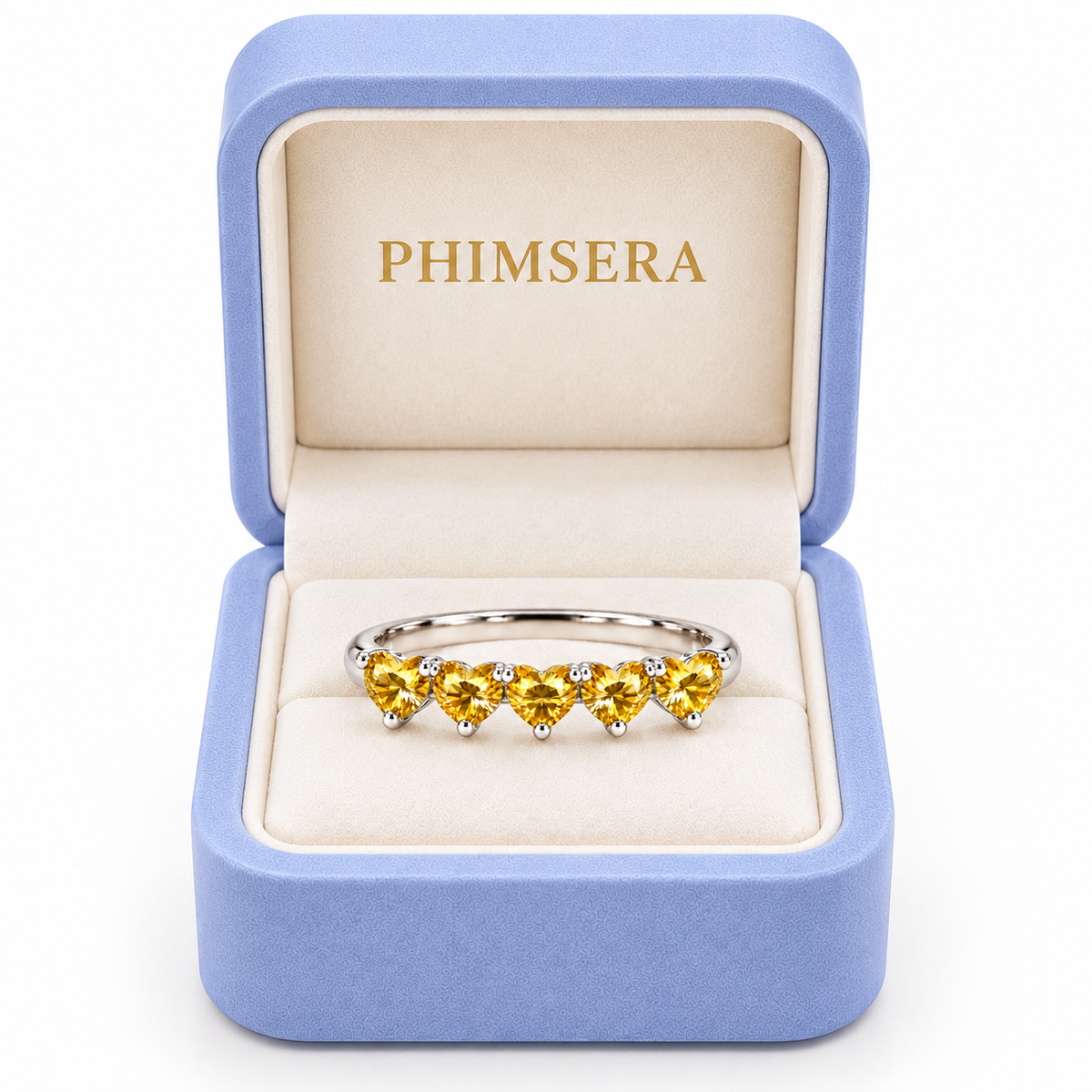 Five 4mm heart-cut yellow moissanite ring presented in a Phimsera jewelry gift box