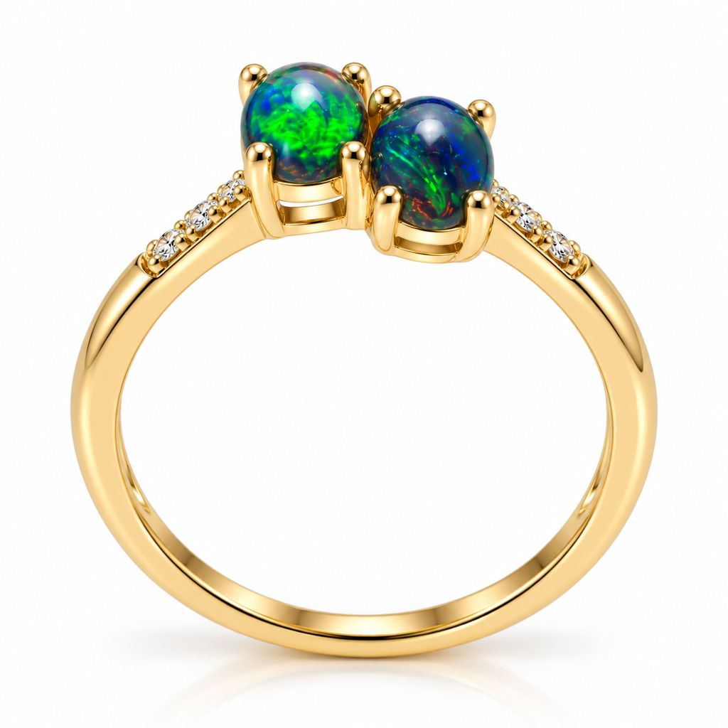 Side profile of a Gold Plated black fire opal ring showing two raised oval gemstone settings, rounded prongs, open gallery construction, and delicate cubic zirconia accents along the shoulders.