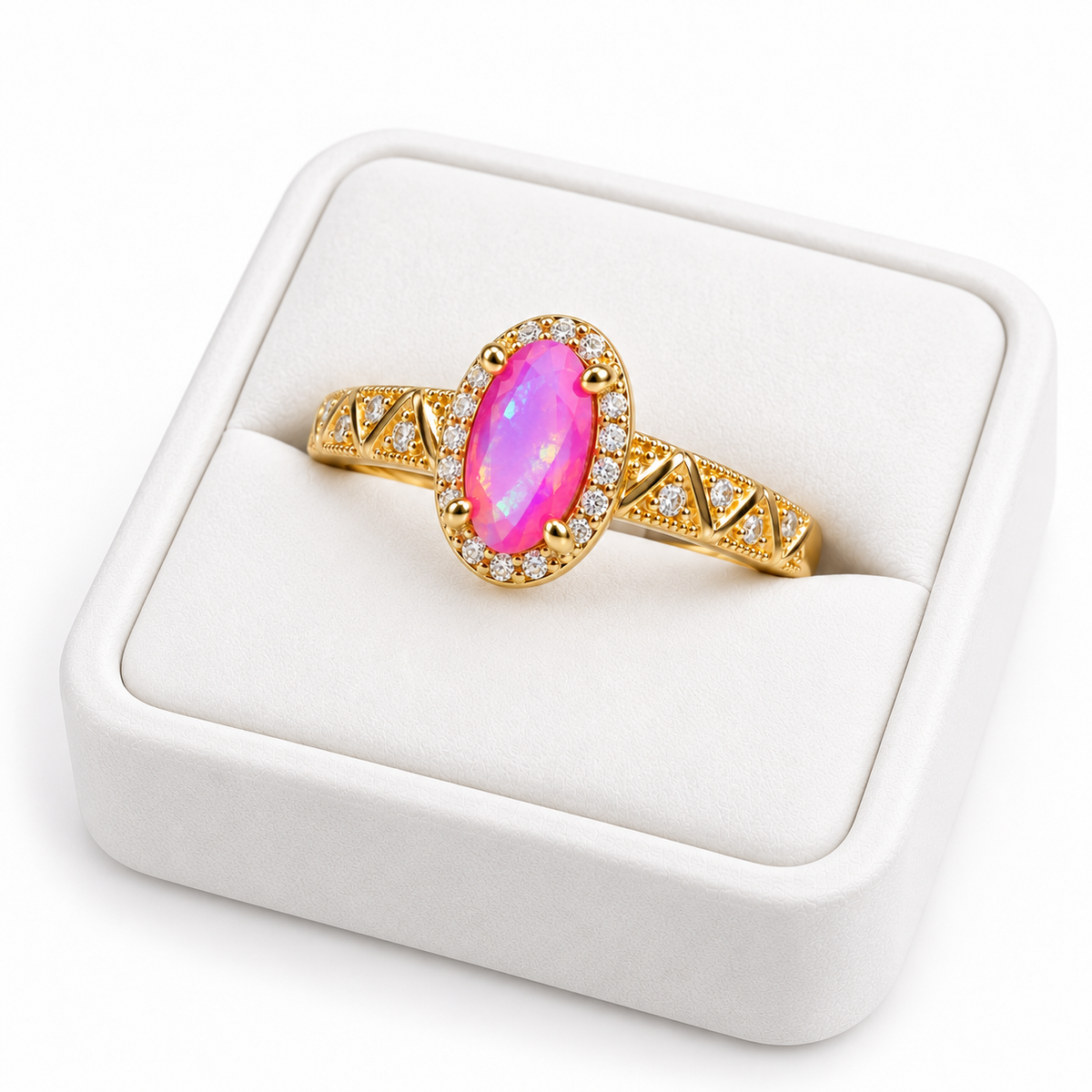 Angled view of a Gold Plated pink Australian opal ring on a white velvet tray, highlighting the cubic zirconia halo and extended geometric zigzag band.