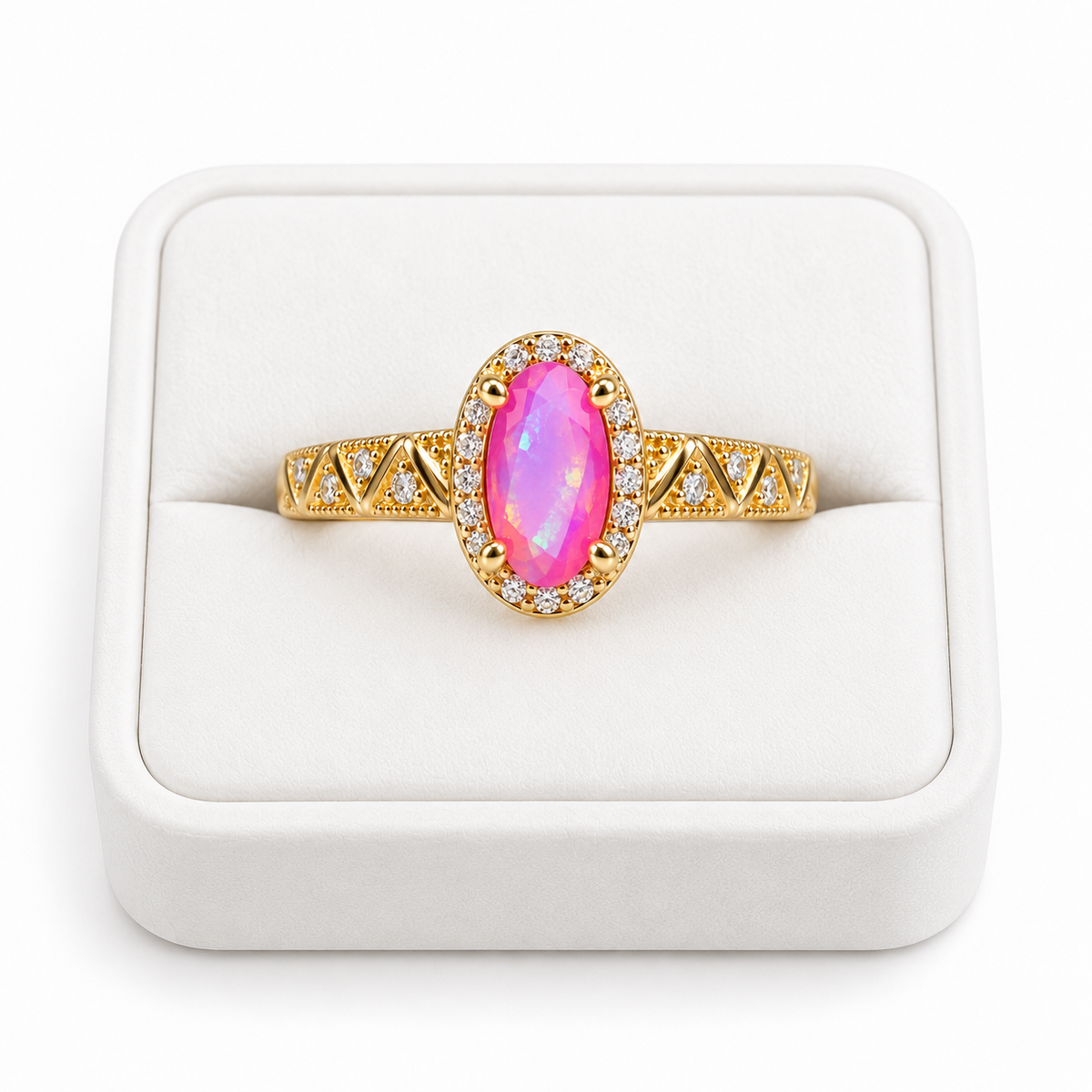 Pink Australian fire opal halo ring with a 4x8mm oval gemstone displayed on a white velvet jewelry tray against a clean white background.