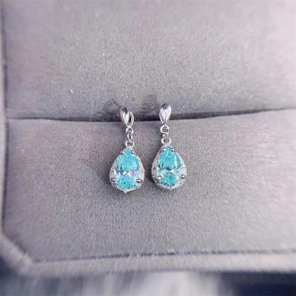 Moissanite Earrings, Moissanite Stud Earrings, Moissanite, White Moissanite, Green Moissanite, Moissanite Earrings Sterling Silver, VVS1 Moissanite Earrings, Green Moissanite Earrings, Green Moissanite Stud Earrings, Half Carat Moissanite Earrings, Women’s Green Moissanite Earrings, Green Moissanite Jewelry, Moissanite Jewelry, Round Brilliant Cut, Blue Moissanite, Blue Moissanite Earrings