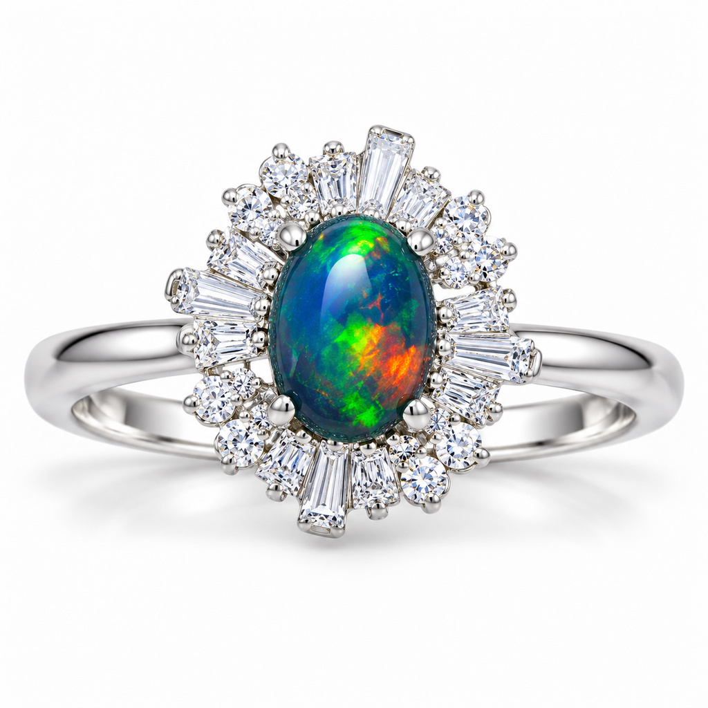 5x7mm oval black opal sunburst halo ring in Platinum Plated sterling silver with round and tapered baguette cubic zirconia stones on a white background.
