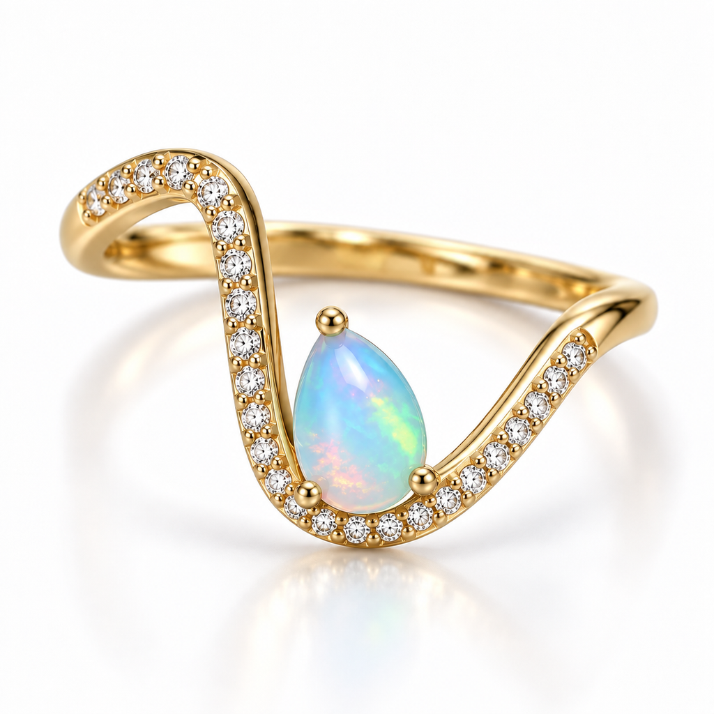 Gold Plated 5x7mm pear shaped natural opal ring shown from an angled view