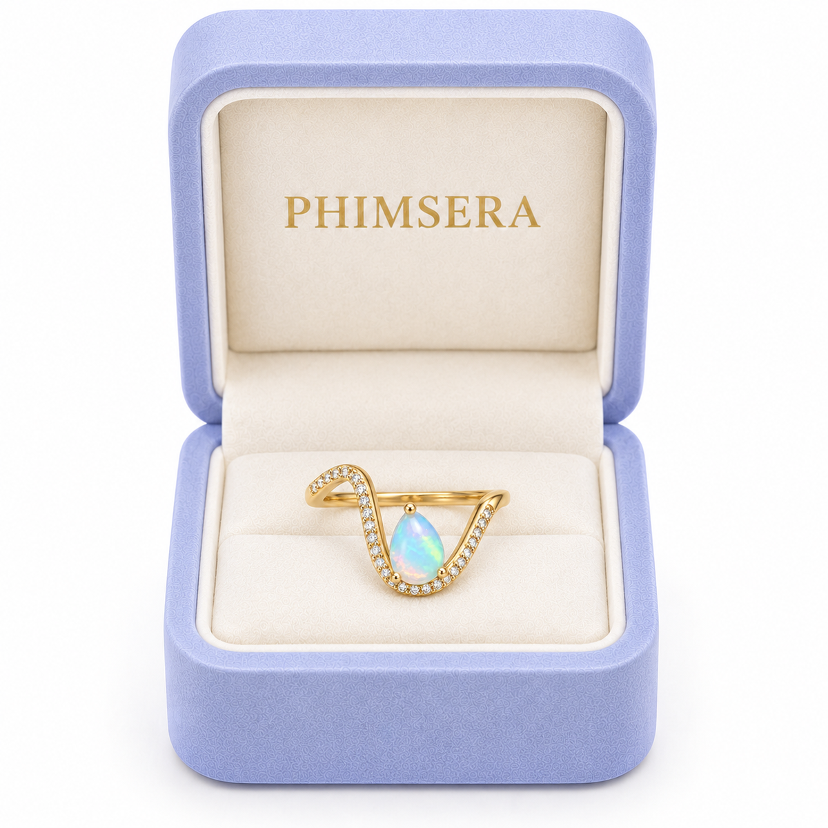 Phimsera 5x7mm natural pear shaped opal ring presented inside a lavender jewelry box