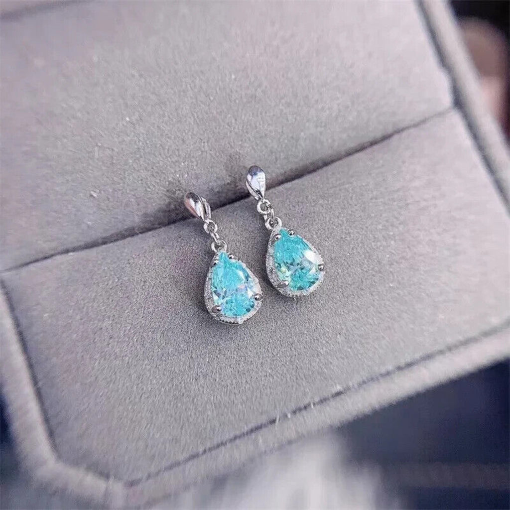 Moissanite Earrings, Moissanite Stud Earrings, Moissanite, White Moissanite, Green Moissanite, Moissanite Earrings Sterling Silver, VVS1 Moissanite Earrings, Green Moissanite Earrings, Green Moissanite Stud Earrings, Half Carat Moissanite Earrings, Women’s Green Moissanite Earrings, Green Moissanite Jewelry, Moissanite Jewelry, Round Brilliant Cut, Blue Moissanite, Blue Moissanite Earrings