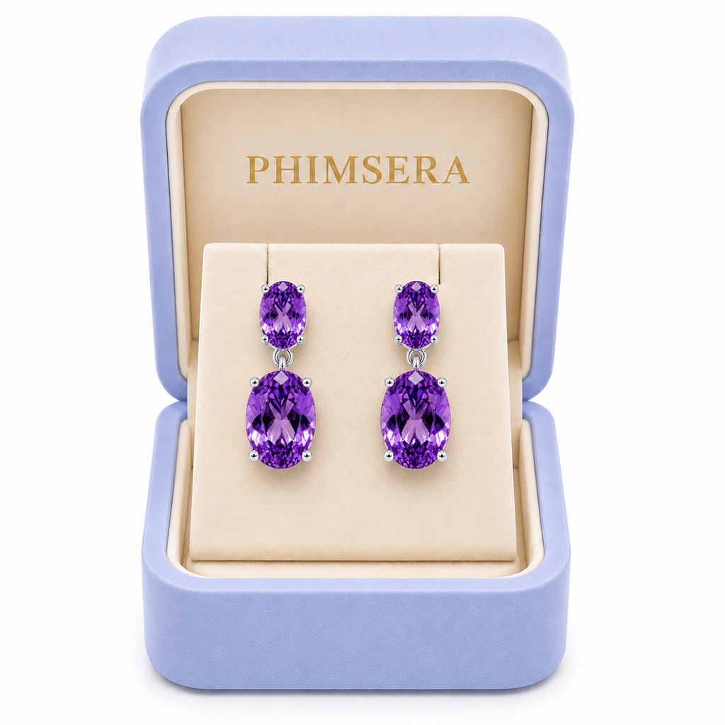 Phimsera natural Amethyst dangle earrings presented in a jewelry box
