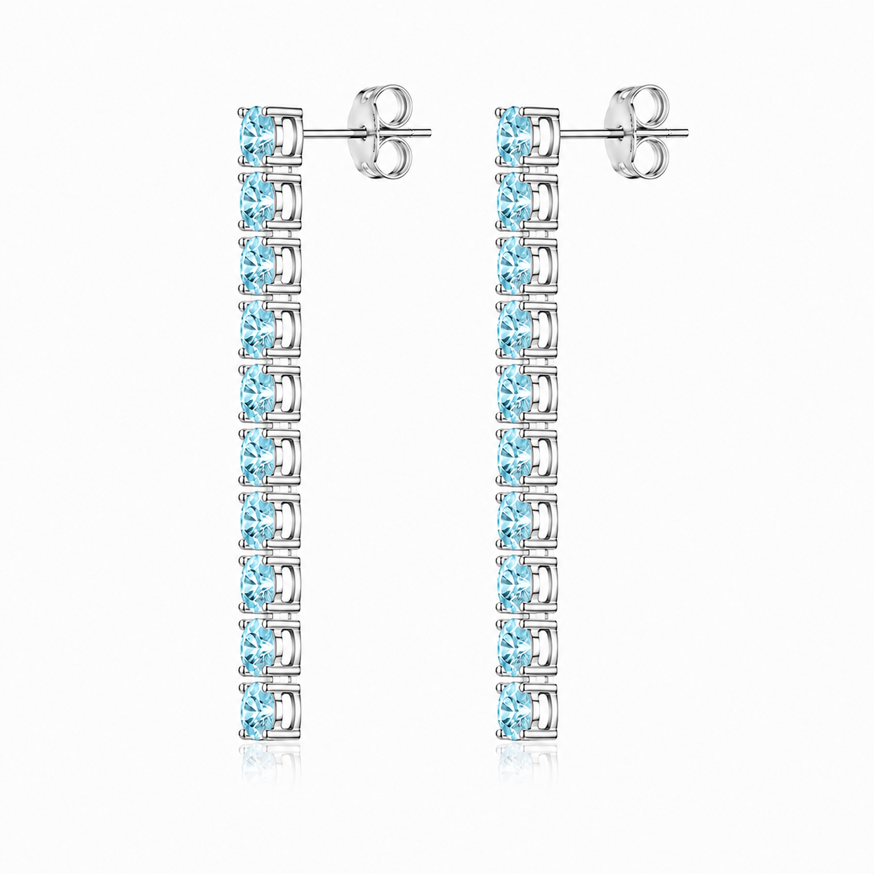 Side view of Phimsera natural aquamarine dangle earrings showing the elongated vertical gemstone design and sterling silver settings