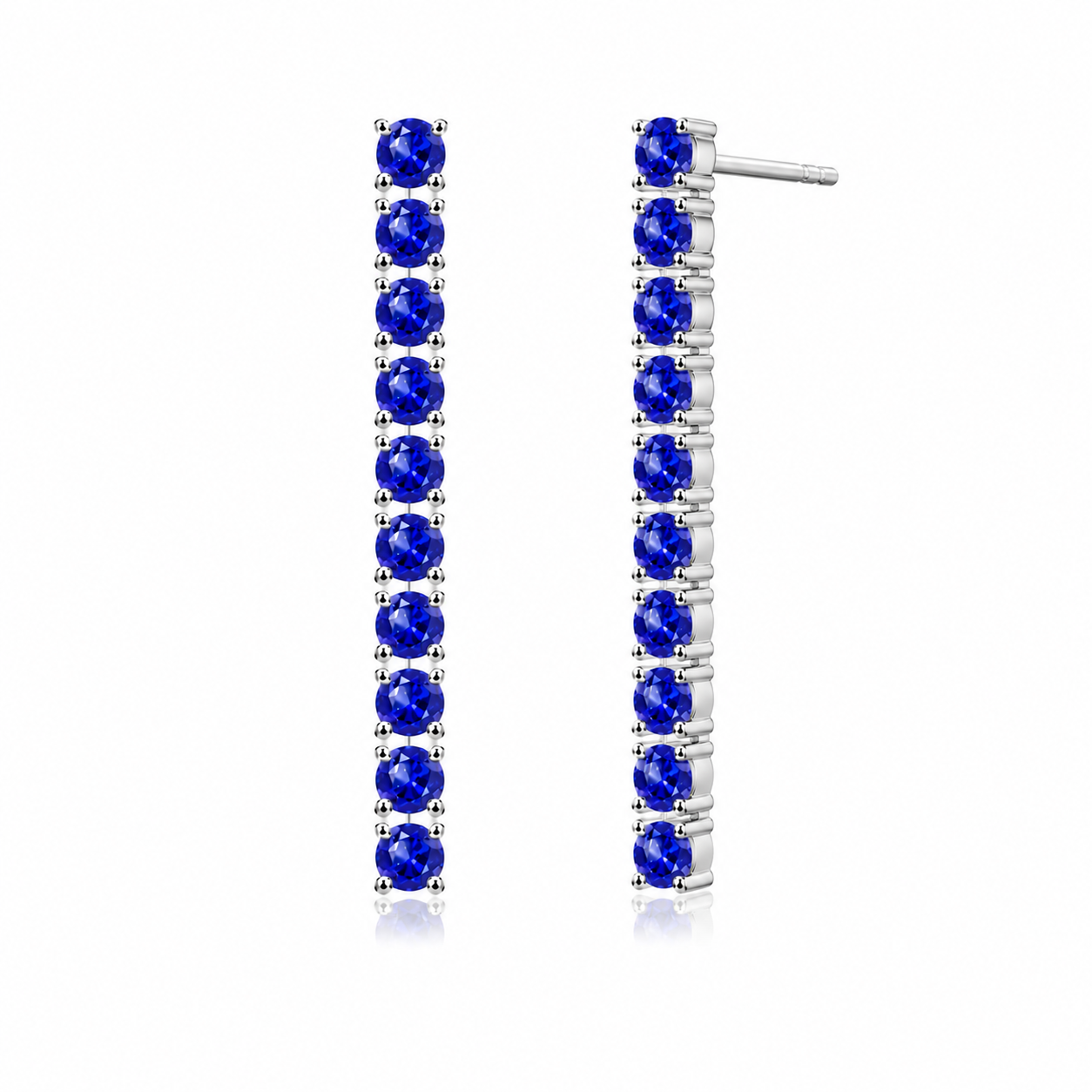 Side view of Phimsera natural sapphire dangle earrings showing the elongated vertical gemstone design and sterling silver settings