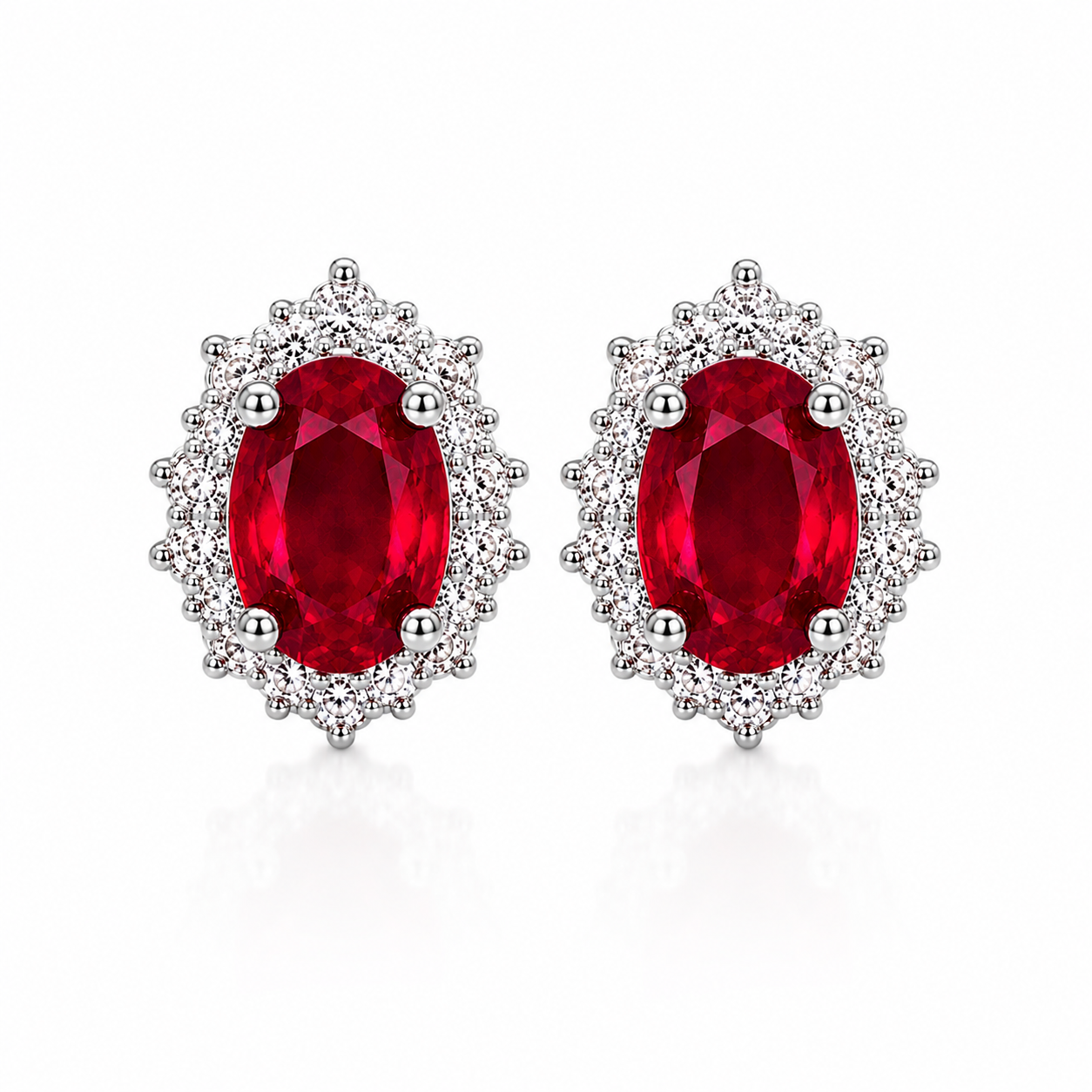 Natural 4x5mm oval ruby halo stud earrings in sterling silver front view
