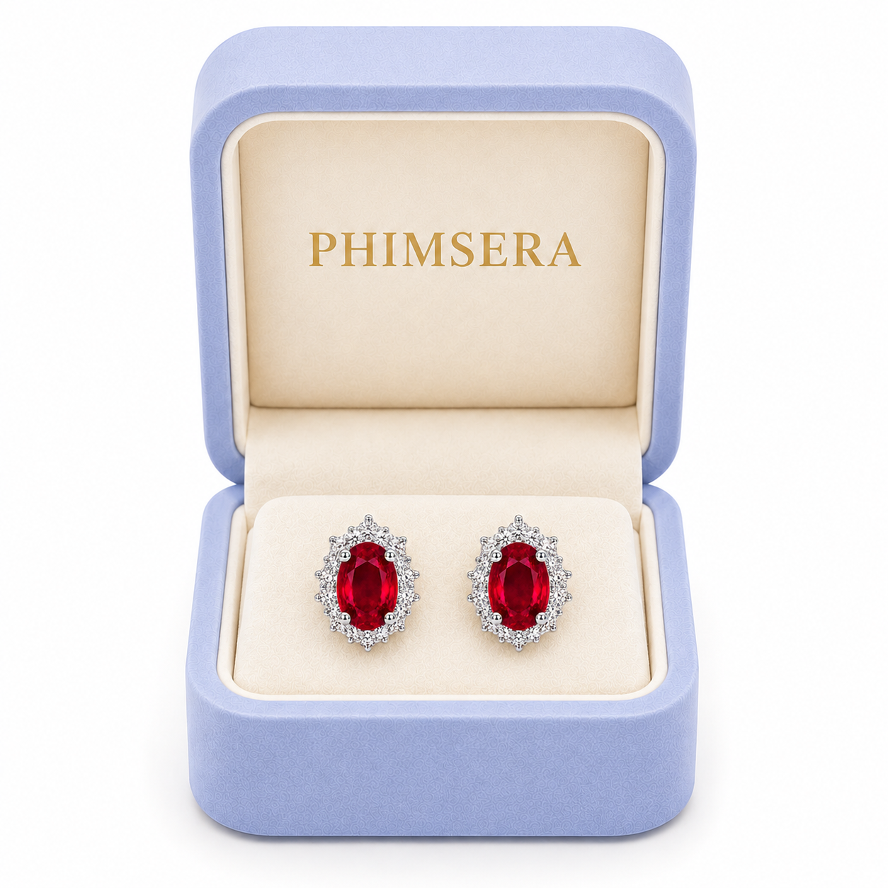 Natural 4x5mm ruby halo stud earrings displayed in Phimsera jewelry gift box