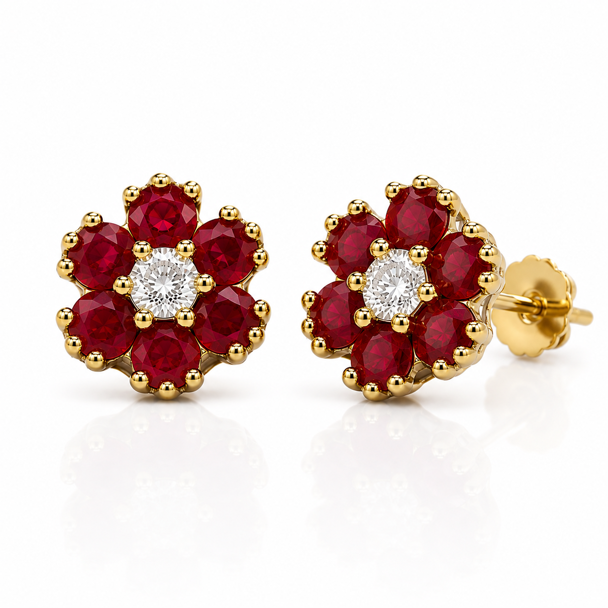 Natural 2.5mm round ruby floral stud earrings shown at a three-quarter angle
