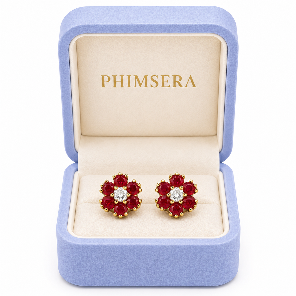Natural ruby flower stud earrings displayed inside a Phimsera jewelry gift box