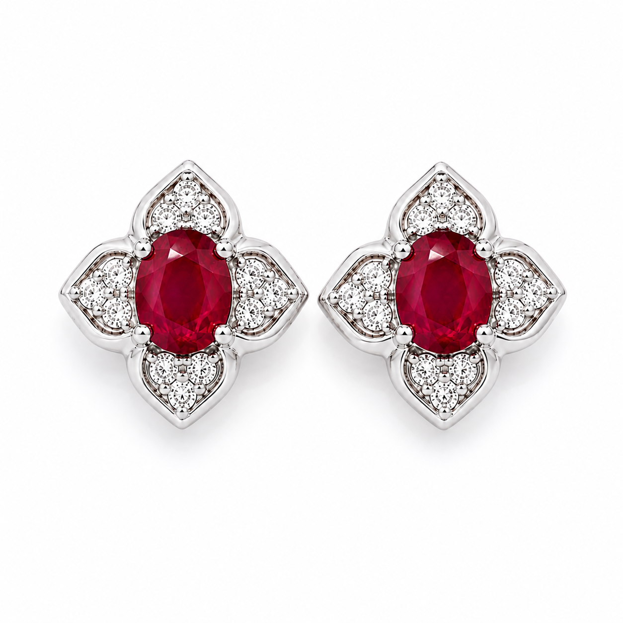 Oval natural ruby and CZ floral stud earrings shown from a top-down view