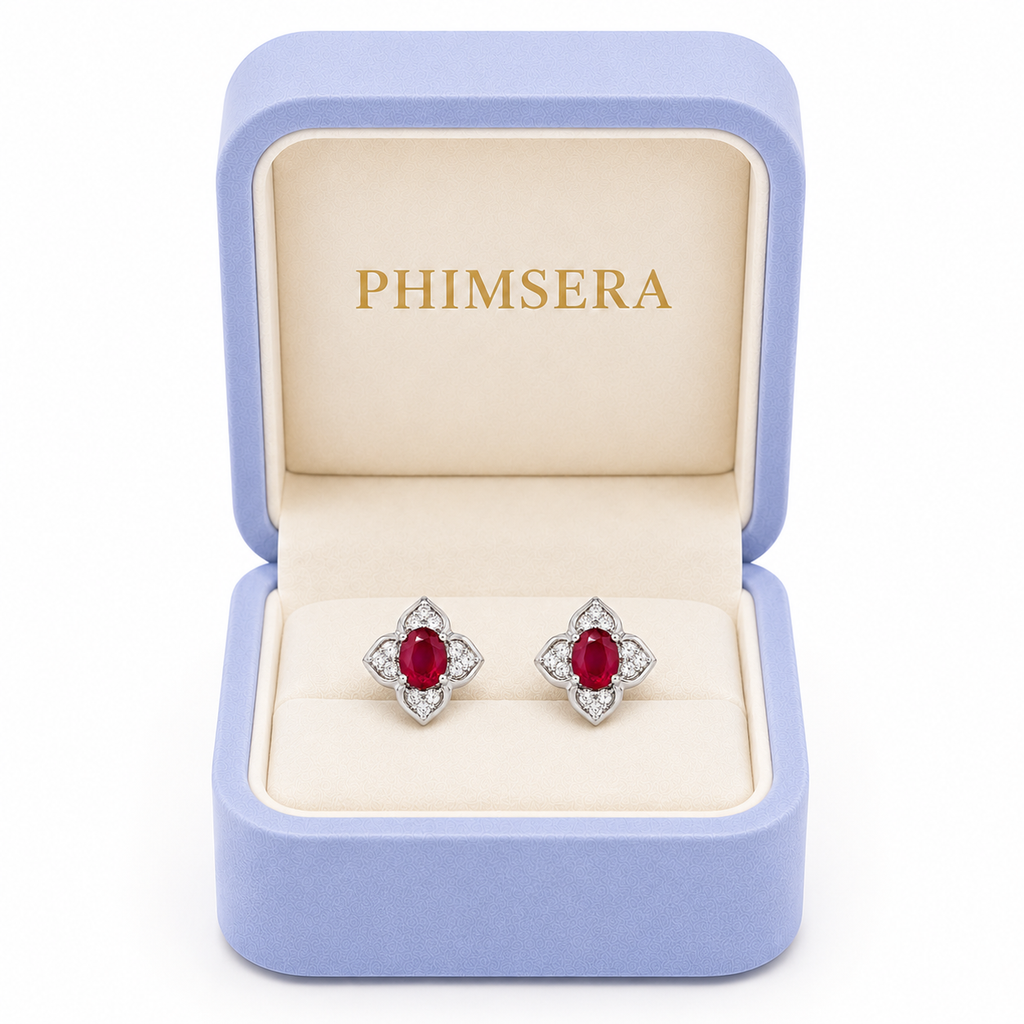 Natural 4x5mm ruby floral stud earrings presented in Phimsera jewelry gift box
