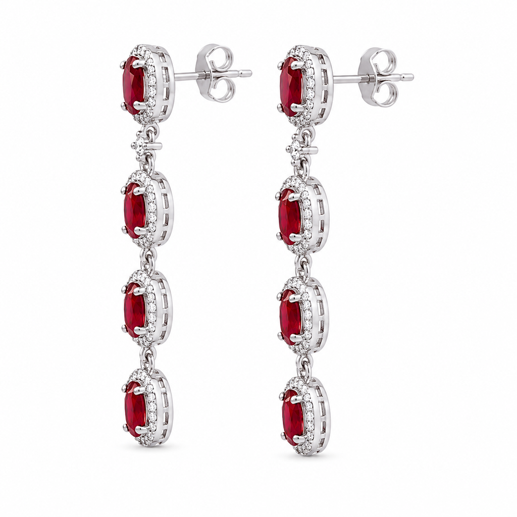 Side view of natural ruby and CZ halo drop earrings in sterling silver