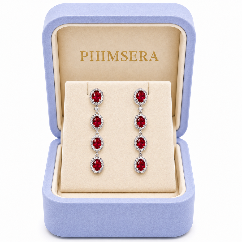 Natural ruby drop earrings displayed in Phimsera jewelry gift box