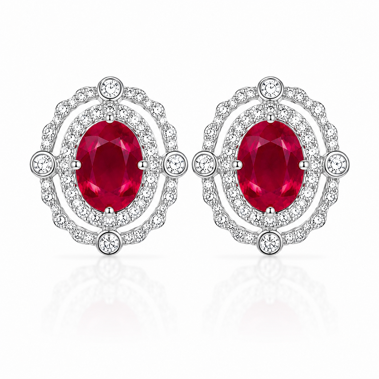 Natural ruby earrings with 6x8mm oval 1.5 carat rubies and sparkling CZ accents in sterling silver