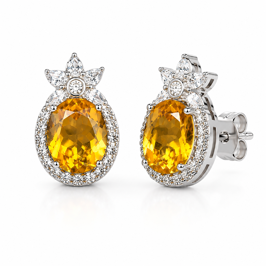 Natural citrine 8x10mm gemstone earrings shown at an angled view in sterling silver
