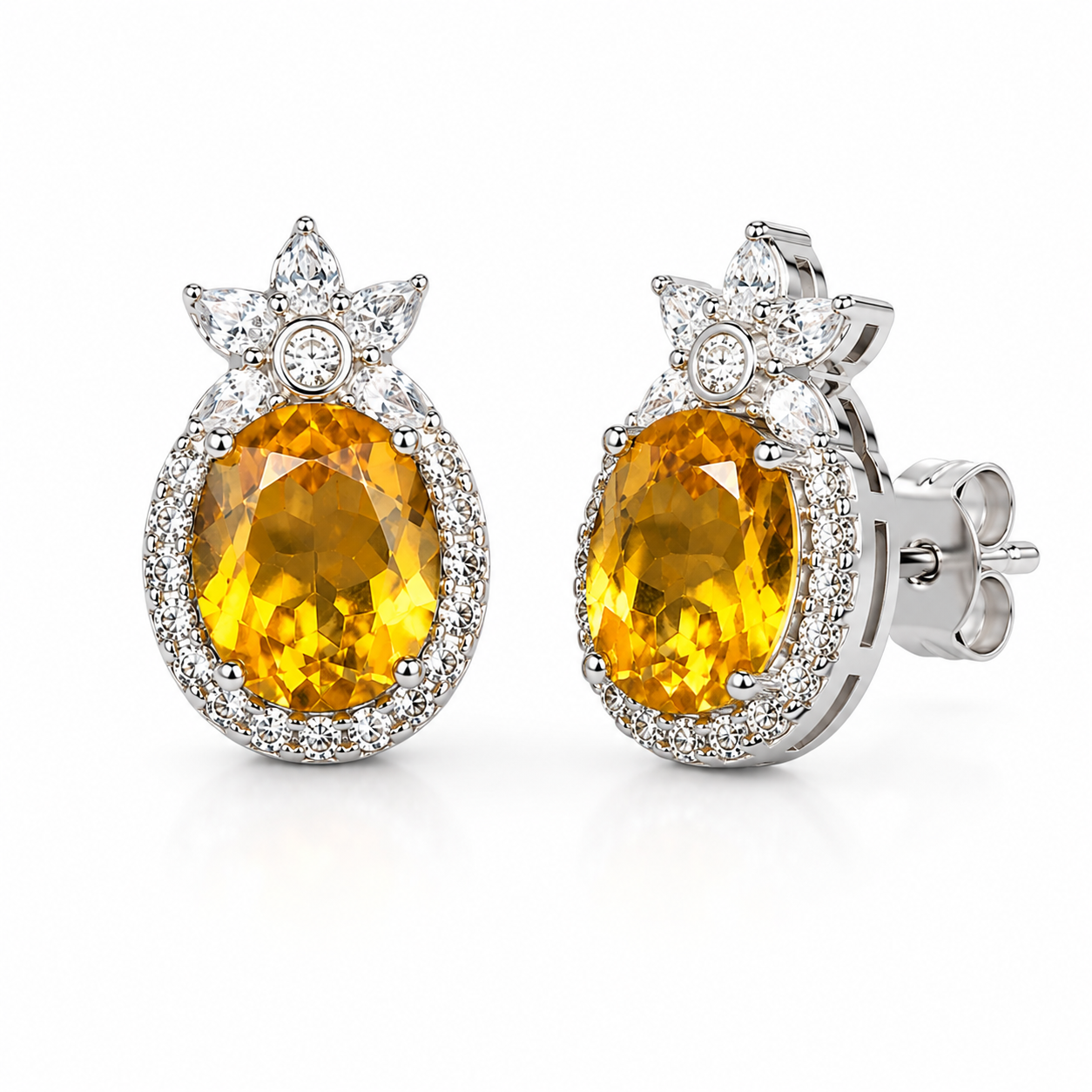 Natural citrine 8x10mm gemstone earrings shown at an angled view in sterling silver
