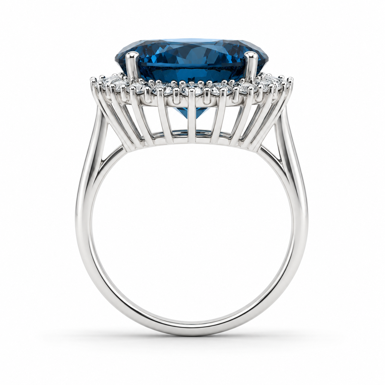 12ct Firework Cut London Blue Topaz halo statement ring featuring a 15mm round genuine London Blue Topaz, sparkling clear cubic zirconia halo, polished 925 sterling silver setting, and custom platinum, gold, or rose gold finish