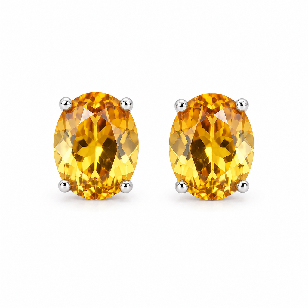 Natural 7x9mm oval citrine stud earrings in sterling silver front view