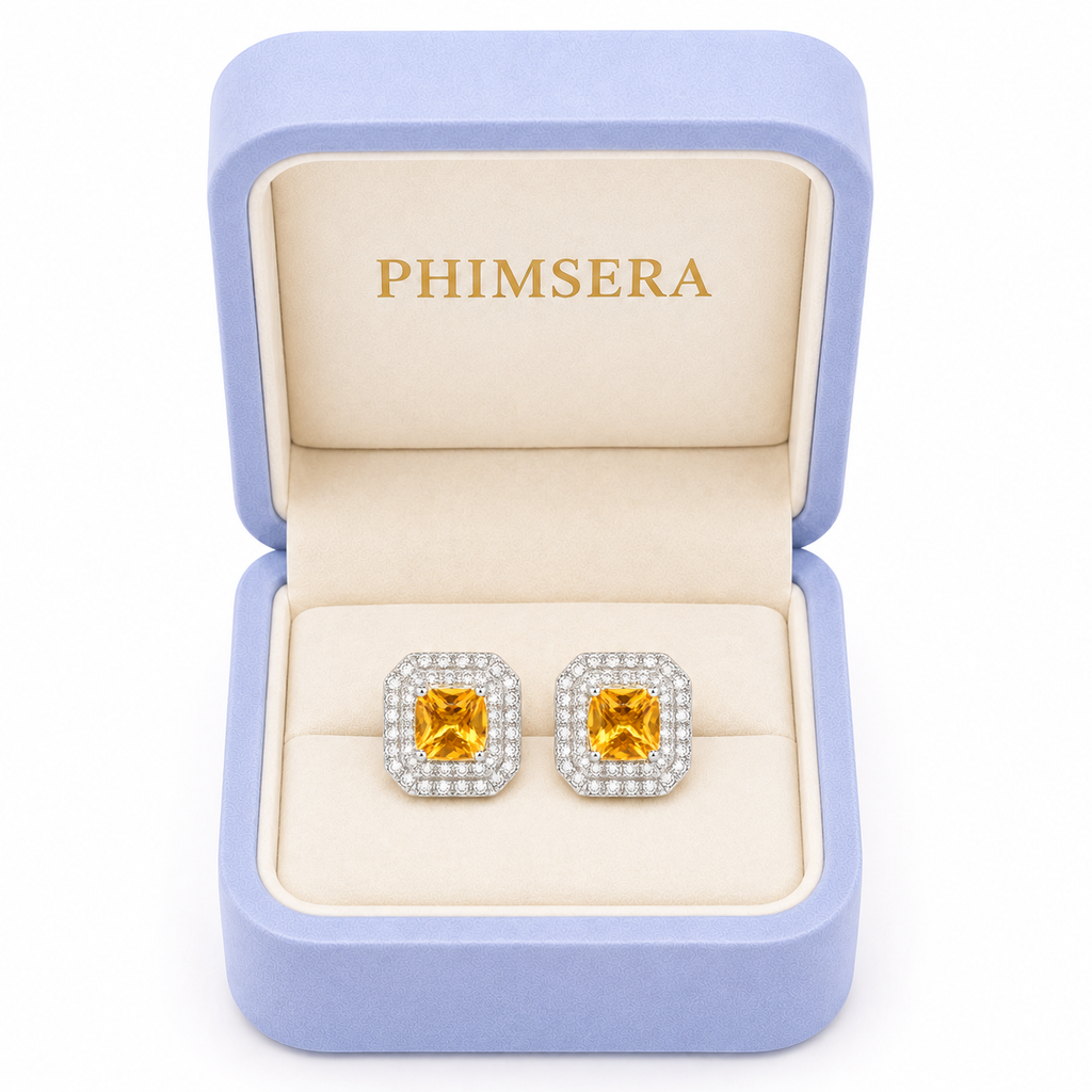 Natural citrine halo stud earrings presented in Phimsera jewelry gift box