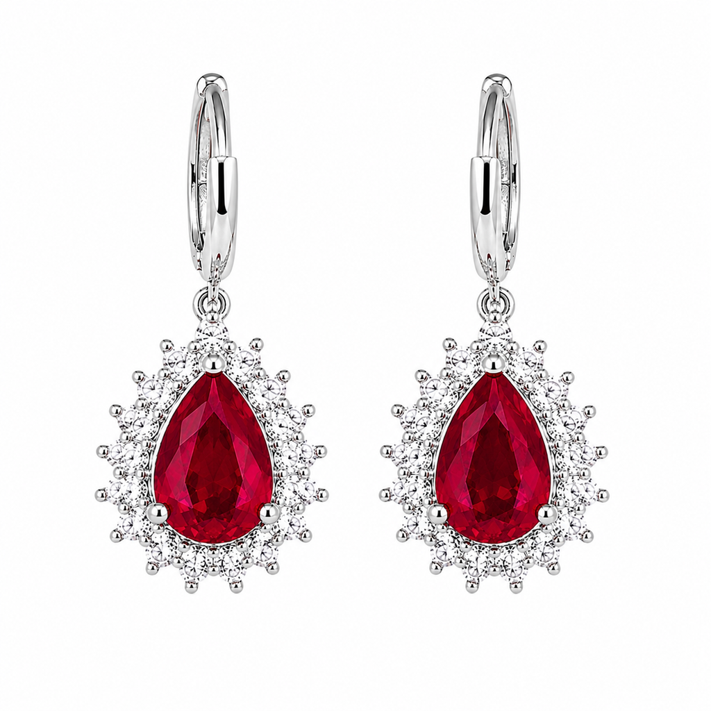 Natural 6x8mm pear-cut ruby drop earrings with cubic zirconia halos in sterling silver
