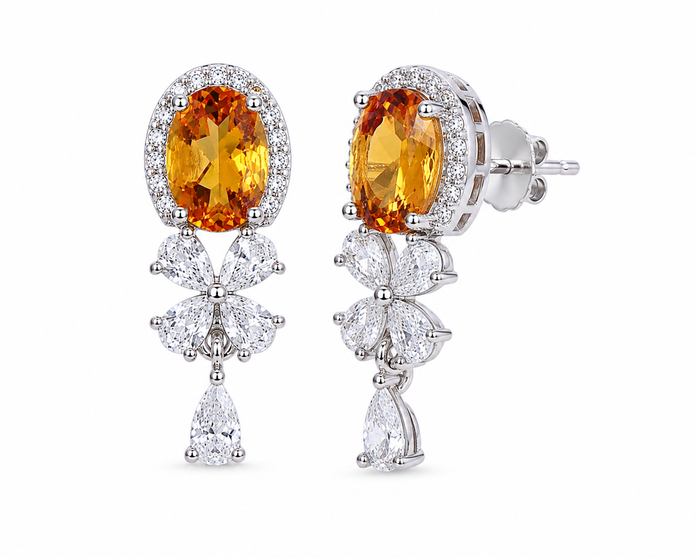 Natural 5x7mm citrine drop earrings shown at an angled view in sterling silver