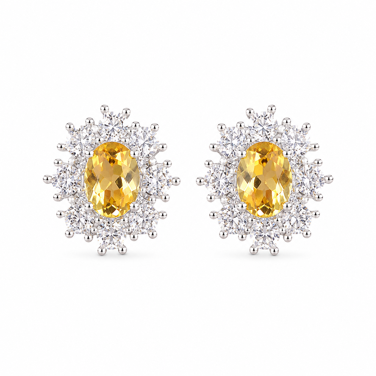 Natural 4x6mm oval citrine stud earrings with sparkling CZ halo in 925 sterling silver by Phimsera