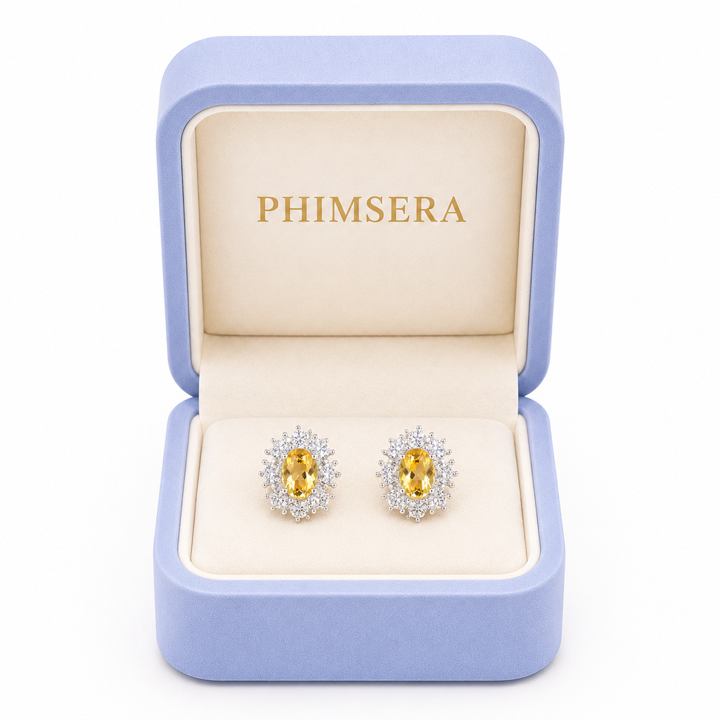 Natural 4x6mm oval citrine stud earrings with sparkling CZ halo in 925 sterling silver by Phimsera