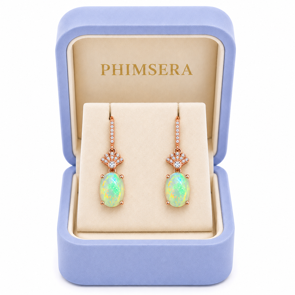 Natural fire opal drop earrings presented in Phimsera jewelry gift box