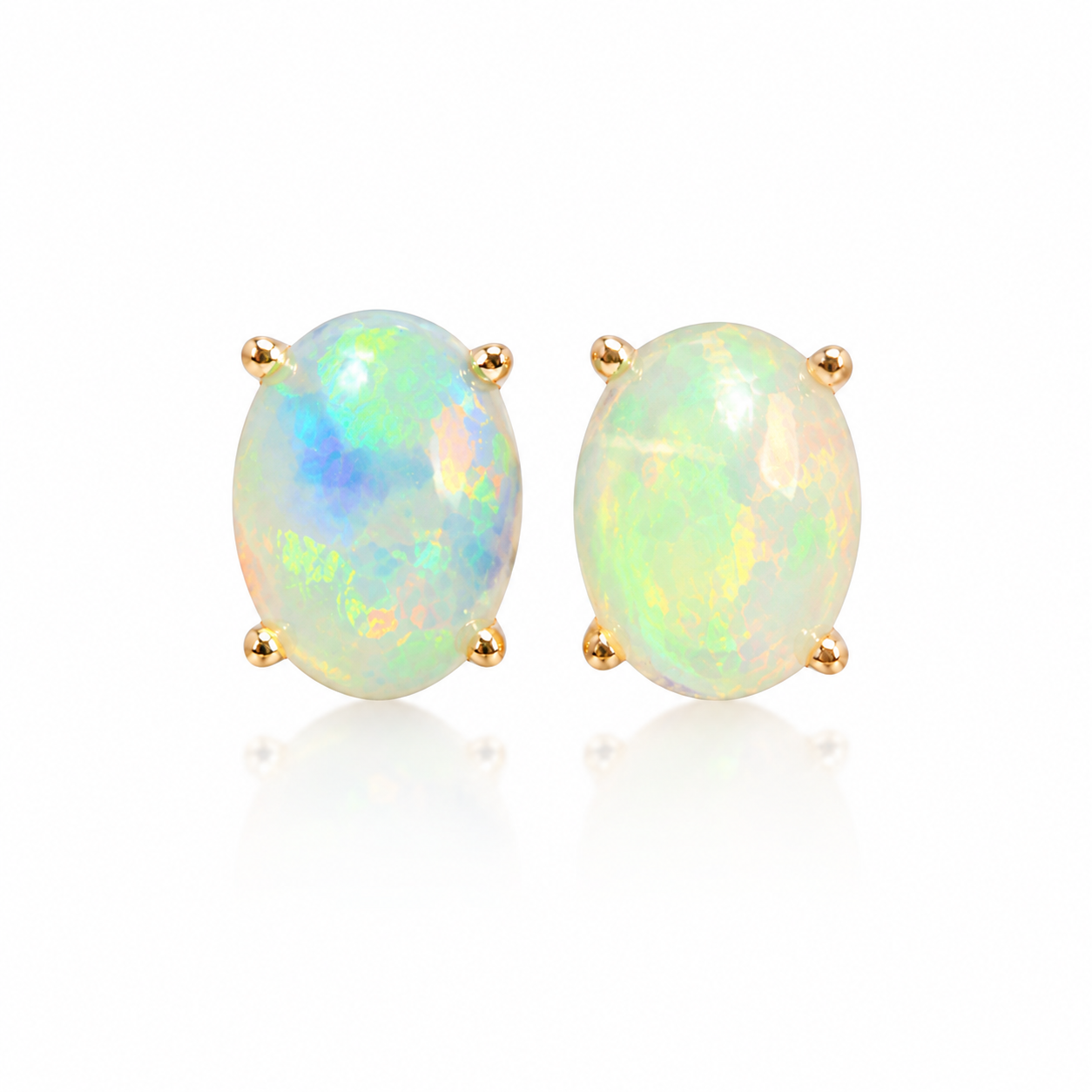 Phimsera 6x8mm natural fire opal stud earrings with oval gemstones in four-prong gold plated settings on white background