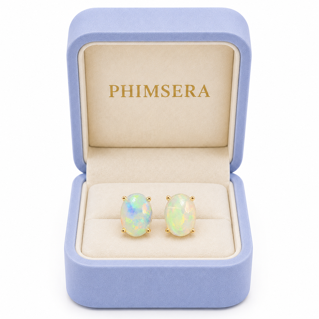 6x8mm natural fire opal stud earrings presented in Phimsera jewelry gift box