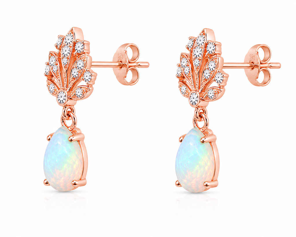 Side profile of Phimsera natural fire opal drop earrings with 5x7mm pear shaped gemstones