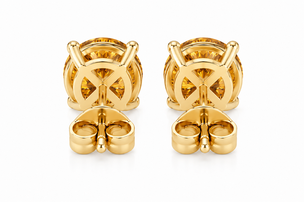 Natural 5mm round citrine stud earrings featuring genuine golden citrine gemstones in classic four-prong 925 silver settings.
