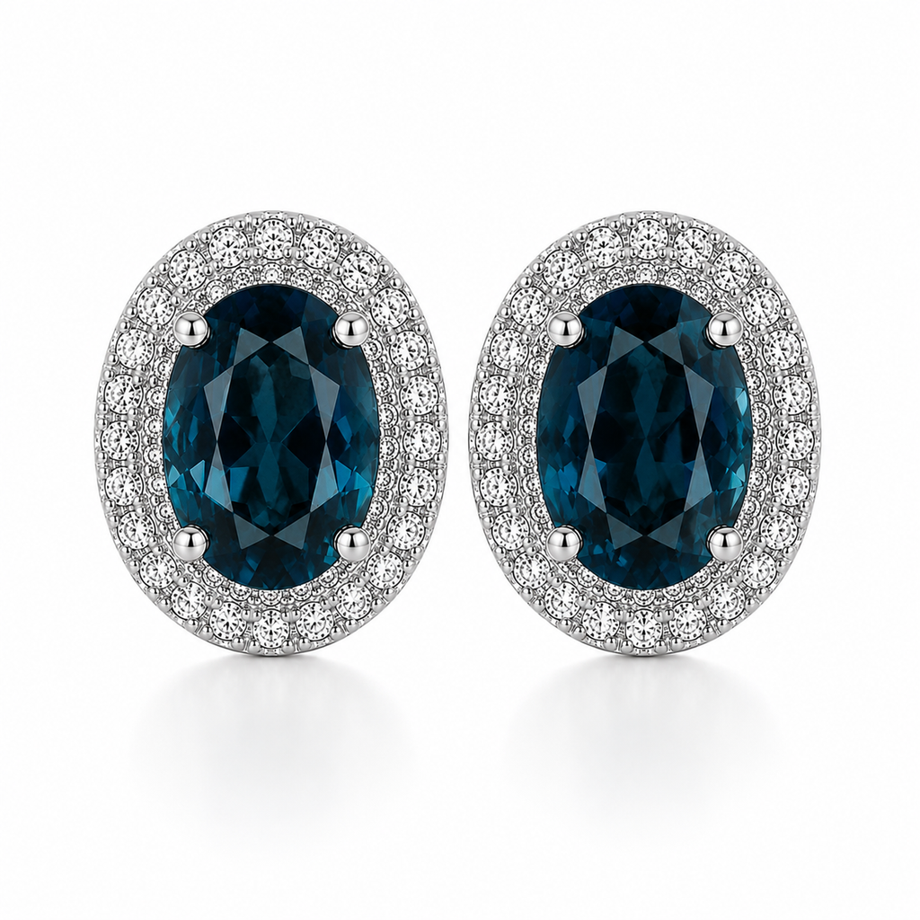Natural London Blue Topaz oval stud earrings with 5x7mm gemstones, double halo cubic zirconia, platinum-plated 925 sterling silver, front view.