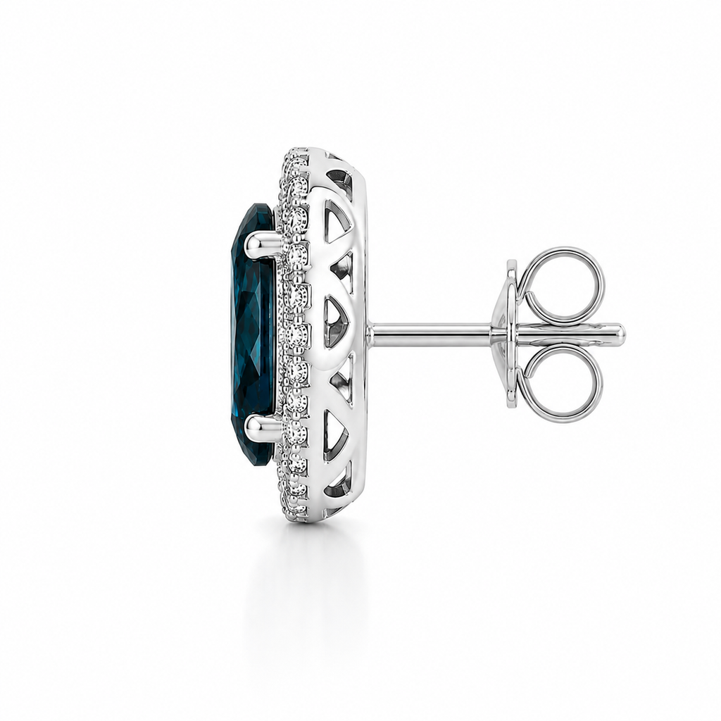 Natural London Blue Topaz oval stud earrings with 5x7mm gemstones, double halo cubic zirconia, platinum-plated 925 sterling silver, front view.