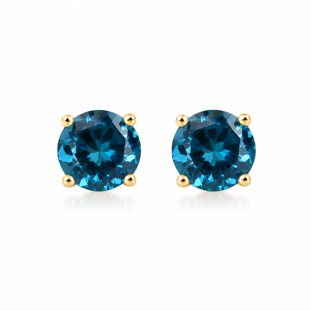 5mm round London Blue Topaz stud earrings in solid 925 sterling silver with four-prong settings on a white background