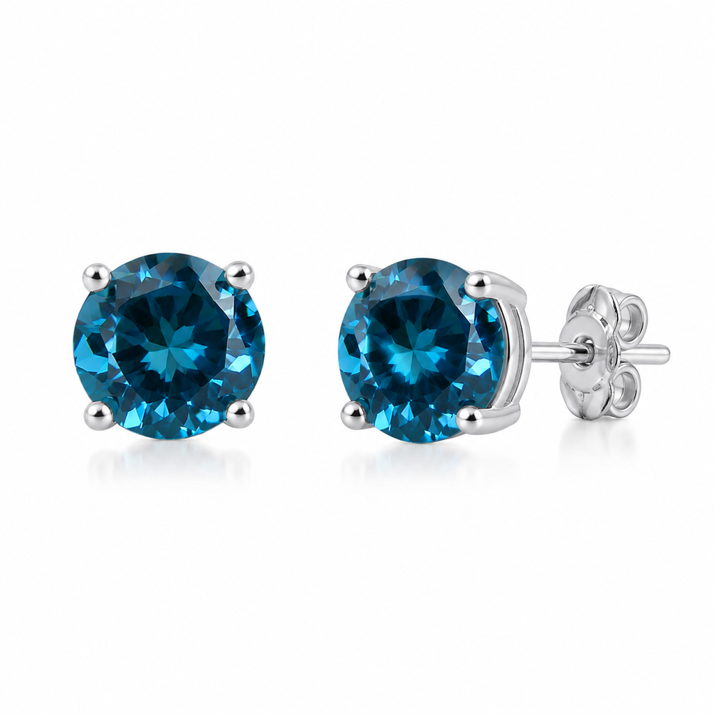 5mm round London Blue Topaz stud earrings in solid 925 sterling silver with four-prong settings on a white background