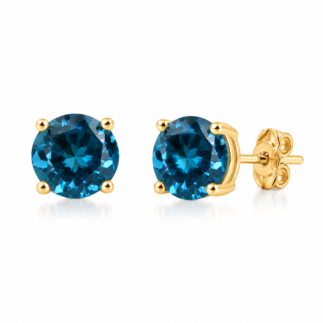 5mm round London Blue Topaz stud earrings in solid 925 sterling silver with four-prong settings on a white background