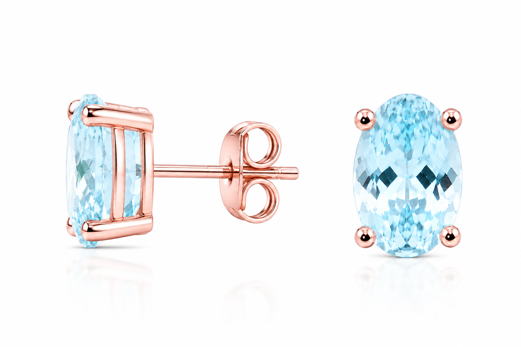 Side profile of natural aquamarine stud earrings showcasing sterling silver craftsmanship