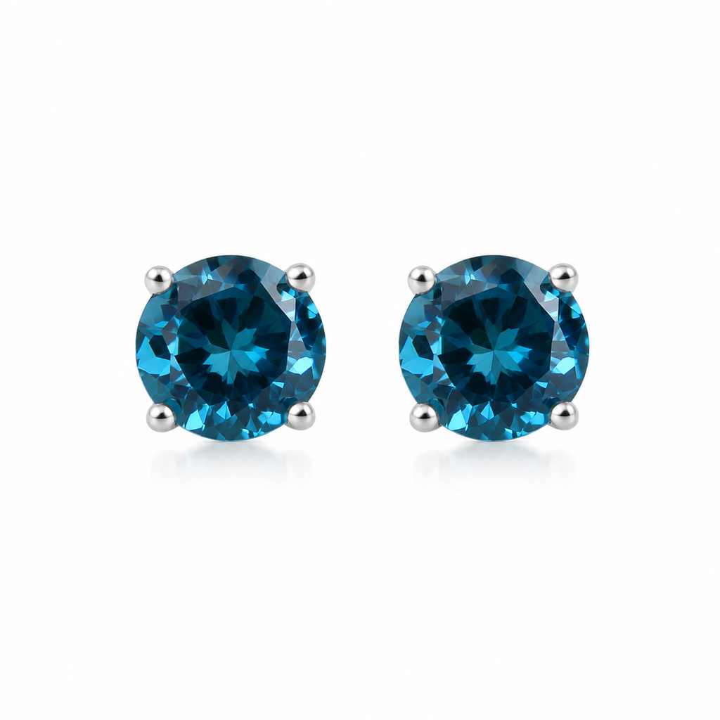 5mm round London Blue Topaz stud earrings in solid 925 sterling silver with four-prong settings on a white background